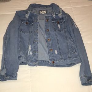 Distressed denim jacket